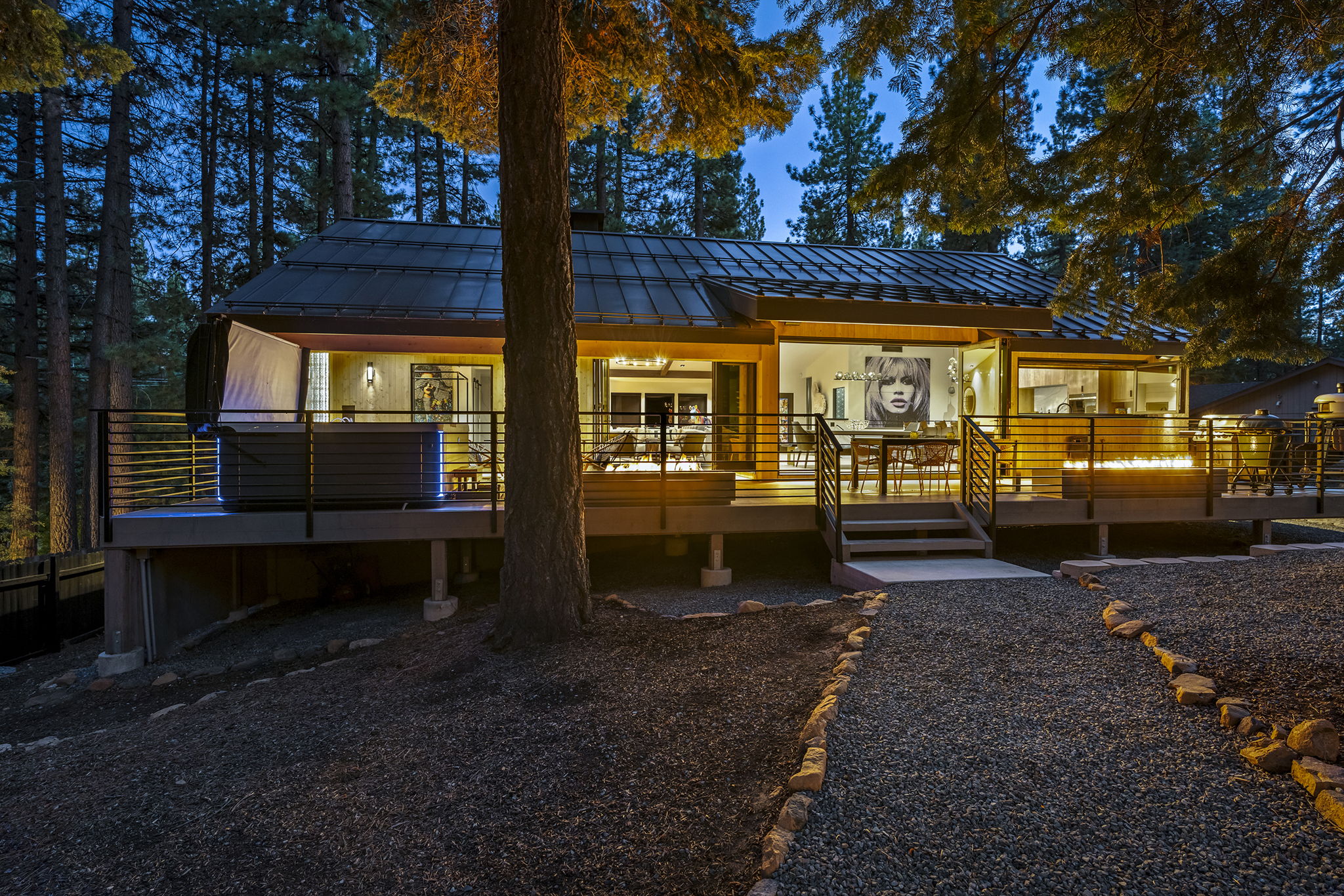 Original unenhanced rear exterior twilight photograph of 896 Donna Drive