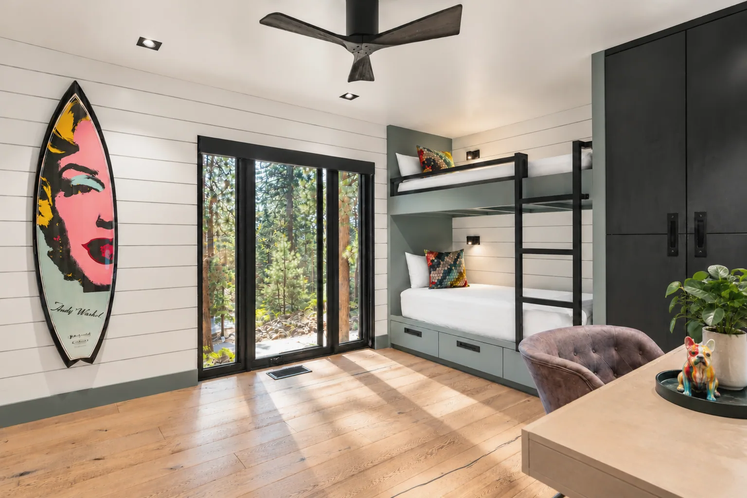 Bright Forest Bunk Room with Pop-Art Surfboard