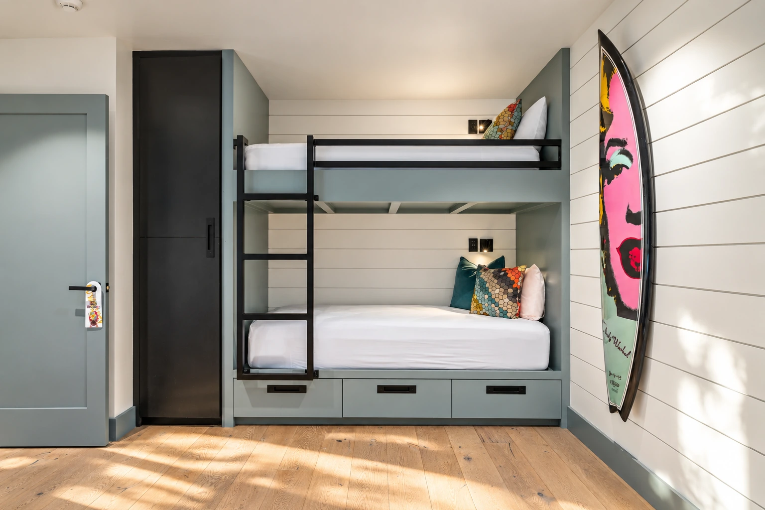 Built-in bunk beds and pop-art surfboard, alternate view